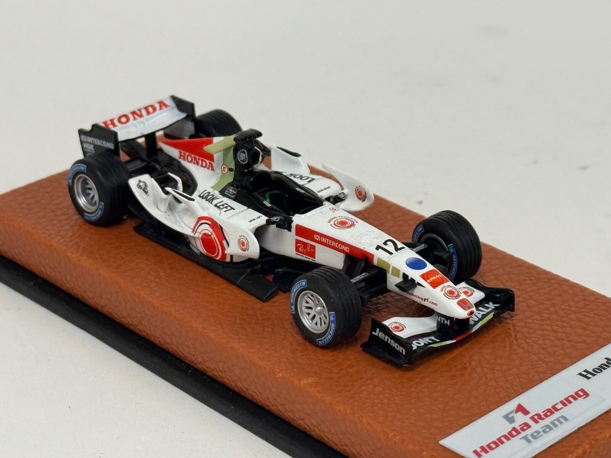 1/43 Honda RA106 from 2006 F1 Season of Jenson Button Leather base 1/43 Honda RA106 from 2006 F1 Season of Jenson Button Leather base