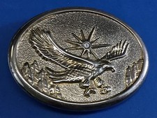 Vintage patriotic flying classic Bald Eagle with sun starburst belt buckle
