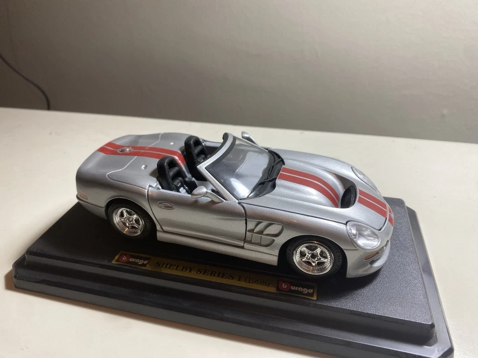 Coche modelo diecast Shelby serie 1 1998 escala 1 Burago Foto 3 de 3