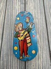 Vintage Tin Litho Noisemaker US Metal Mfg CO Mariachi Tear Drop Spinner