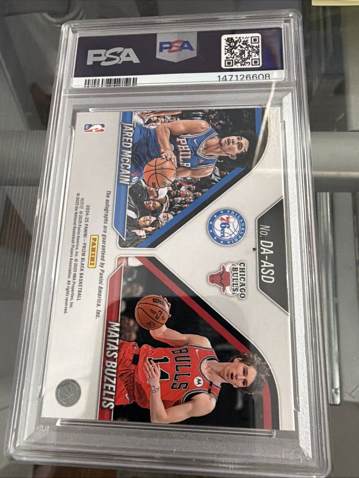 2024-25 Prizm Black Jared McCain/Matas Buzelis  Dual Autographs PSA 8 view 2