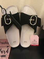 womans black flat sandals with gold buckle