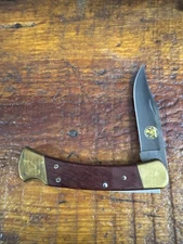 Buck 110 Alaskan Guide variant Brass/Rosewood/Black Cerakote S30V  2004. USA.