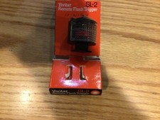 Vivitar SL-2 remote flash trigger via hot shoe or PC outlet.