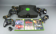 Console Microsoft XBOX, 2 manettes + 3 jeux + plug micro-casque.