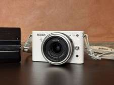 **LEGGI** Nikon 1 J1 + Obiettivo 11-27.5mm 1:3.5-5.6 Fotocamera Mirrorless