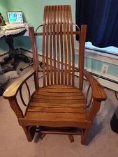 Amish Oak swivel, gliding, and rocking chair. Bought new used twice.