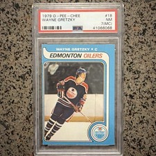 1979 OPC #18 WAYNE GRETZKY ROOKIE CARD PSA 7 MC NEAR MINT. rookie card picture