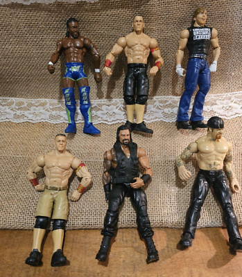 Lot Of 6 WWE Wrestling Figure John Cena ,Undertaker Bruce, Roman Reigns + 3 more