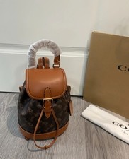 C0ACH Harper BackPack With Horse and Carriage...