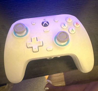 Gamesir g7 Se  very high mid condition cable included works perfectly fine