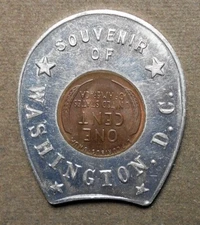 Washington D.C., Souvenir Of. Encased 1937P 1c, horseshoe holder, toned uncircul