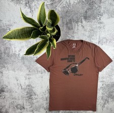 Vintage Oakley Since 75 RARE Outdoor Gorpcore Brown Print Center Logo T-Shirt