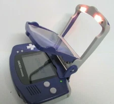 NINTENDO Game Boy Advance AGB-001 Handheld System Game & MadCatz Magnifier Light
