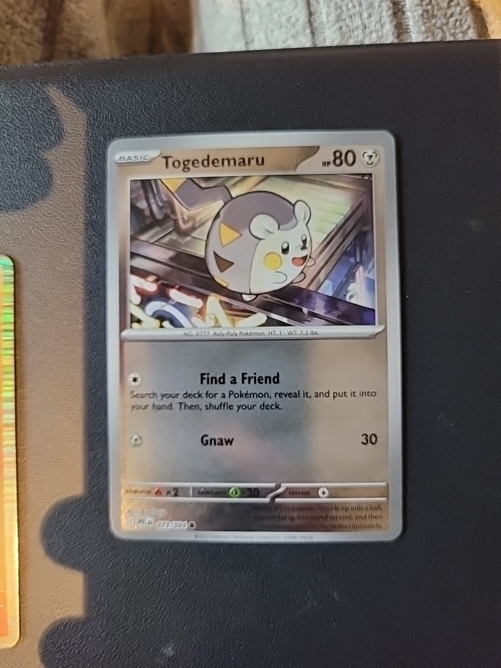 Togedemaru 073/094 Me02: Phantasmal Flames Reverse Holo