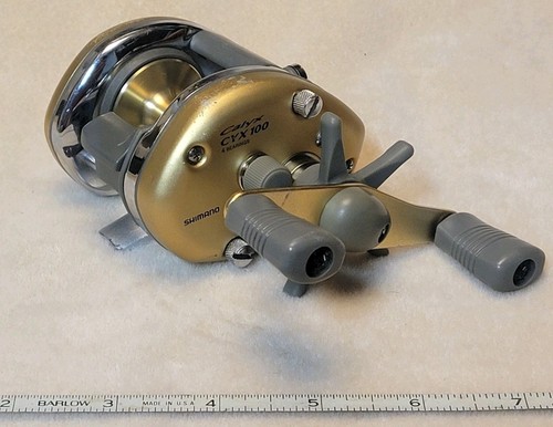Shimano Calyx CYX100 Fishing Reel 4 Ball Bearings Bass Casting Gold - Picture 2 of 7
