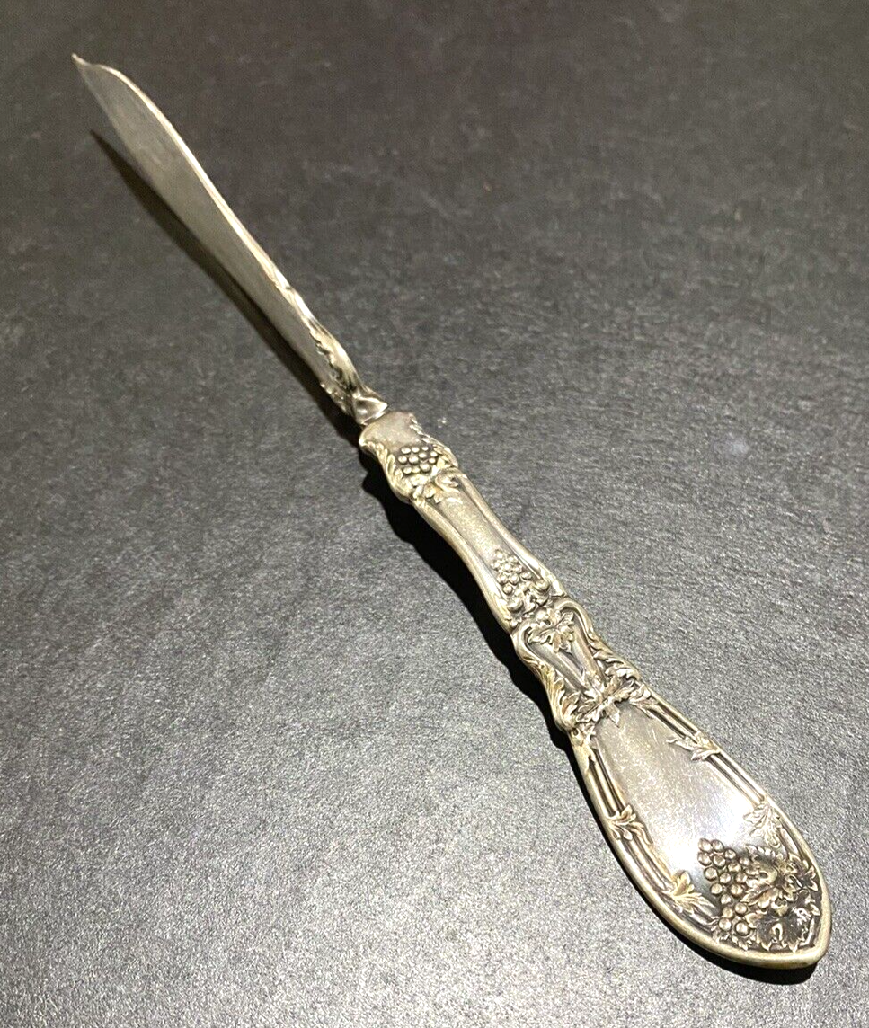 1881 Rogers A1 Butter Knife Twisted Handle Antique Silver