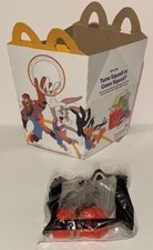 McDonalds Happy meal box and sealed bag of Willy Coyote.