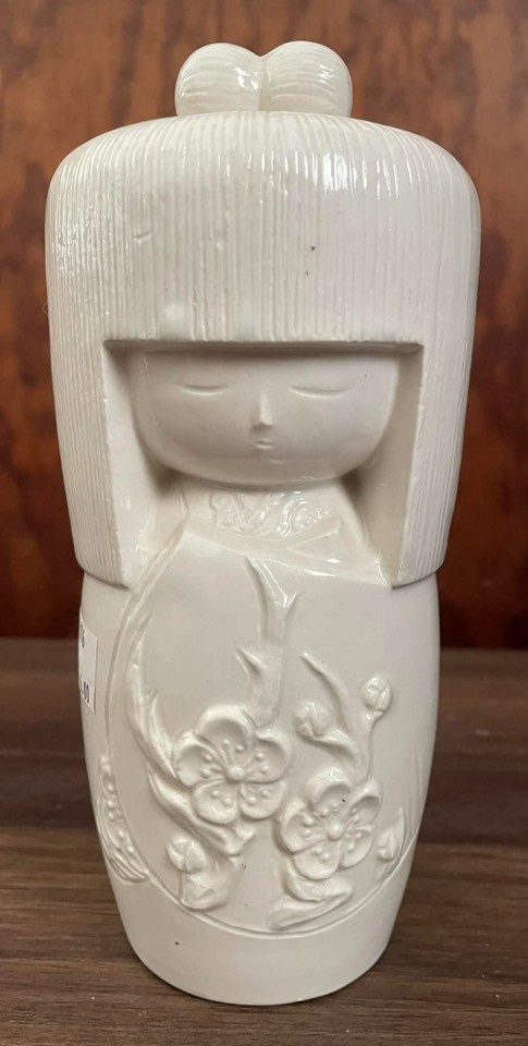 A ceramic Kokeshi-doll tiki mug from Benihana — the intersection of Japanese folk art, mid-century tiki culture, and restaurant nostalgia is genuinely wild.