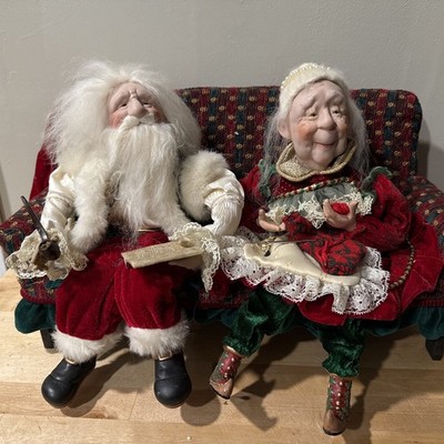 Mr & Mrs Santa Clause On Sofa Tired Exhausted Day After Christmas Old Couple