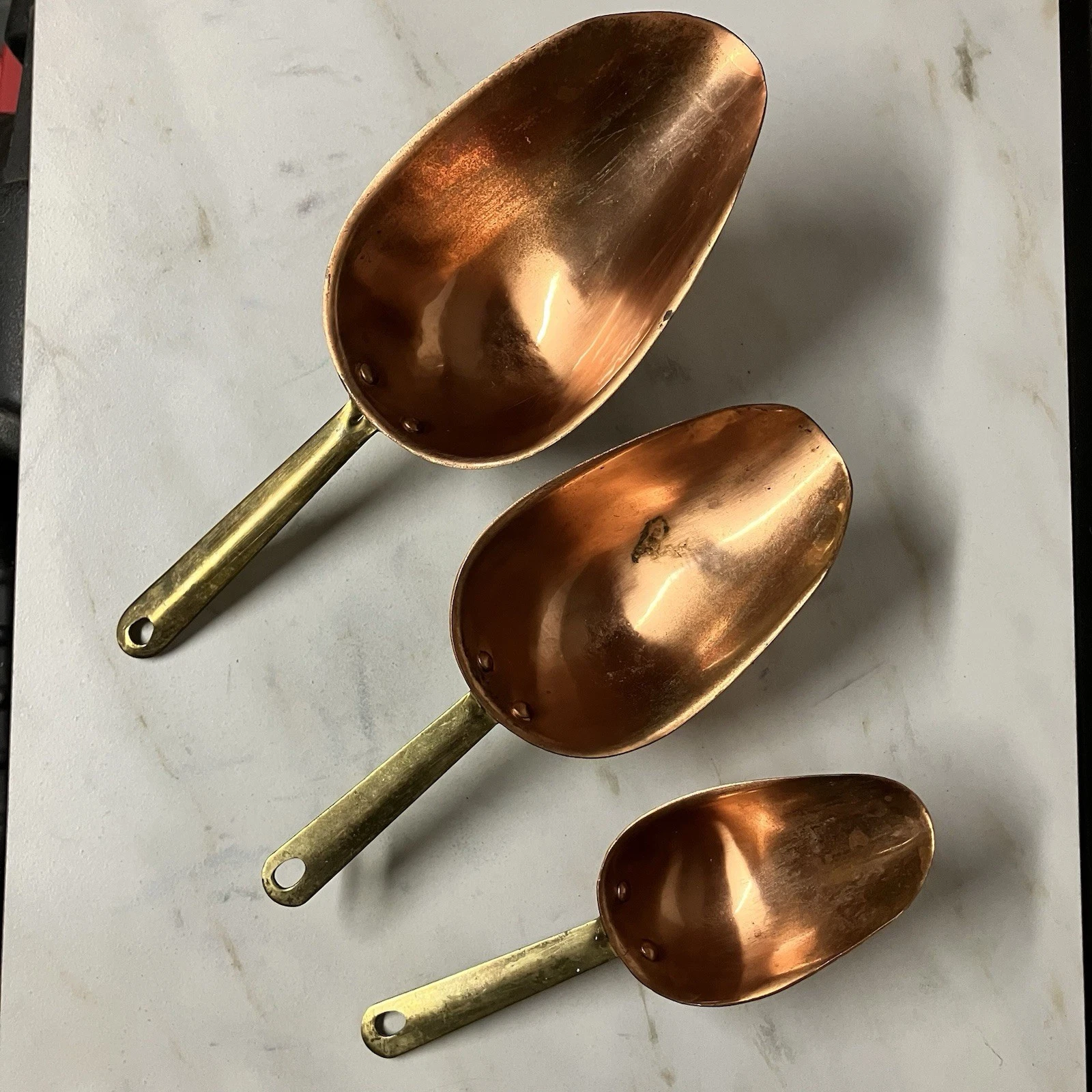Possibly A Set Of 3 Brass Copper Kitchen Measuring Scoops
Opens in a new window or tab