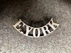 WW1 period East Yorkshire Regiment brass shoulder title hex lugs
