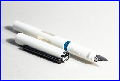 1989 made PELIKANO fountain pen in WHITE & BLACK w STEEL EF nib / Model 7 P 450