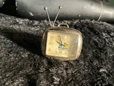 WATCH 1990’s ART  DECO  miniature tv, silver tone opens up very heavy clock