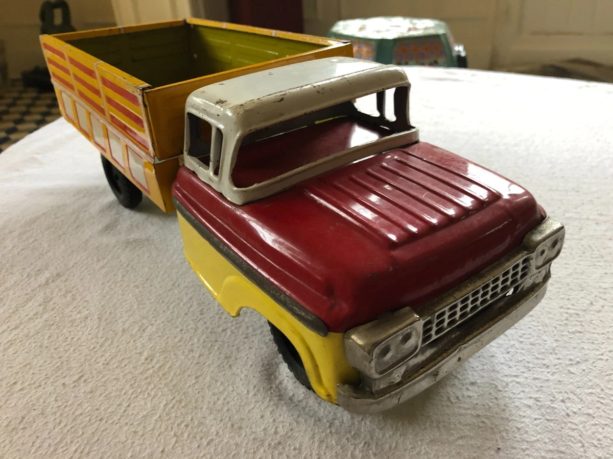Jouets et jeux anciens en tôle pour camions