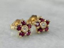 Round Simulated Red Ruby Flower Women's Stud Earrings In 14K Yellow Gold Plated