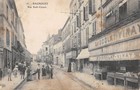 CPA 93 BAGNOLET / LA RUE SADI CARNOT / MAGASIN CHOCOLAT VINAY / cpa rare