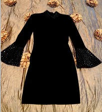 JOVANI Little black dress size 6 worn once Evening Metal Studs On Sleeves huggin
