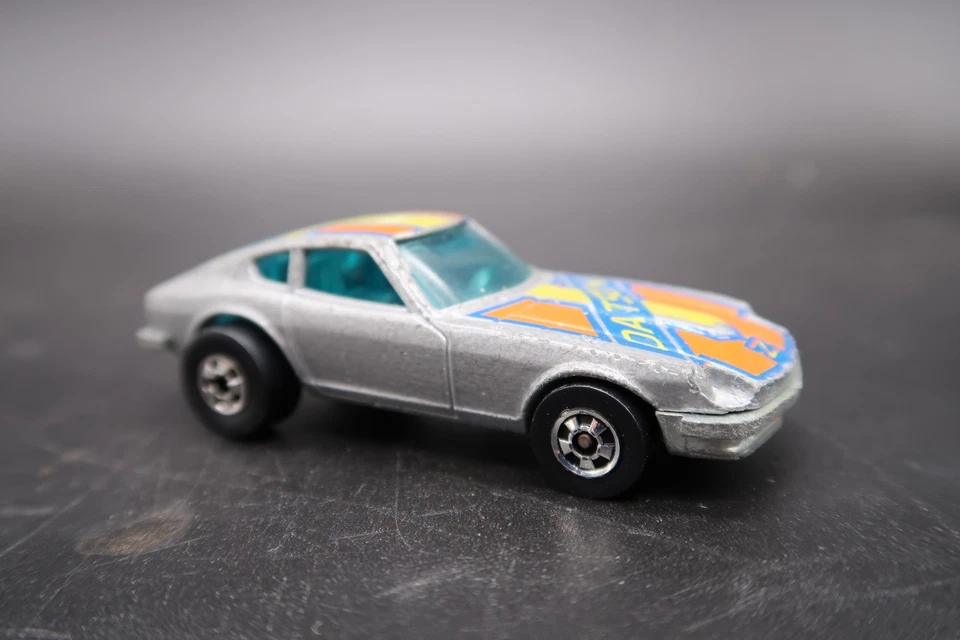 Neumáticos Blackwall Hong Kong Hot Wheels Datsun Z Whiz 1976 vintage gris plata Foto 4 de 4