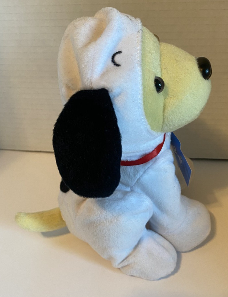 Raising Cane's Yellow Labrador dressed as snoopy Charlie brown Peanuts plush