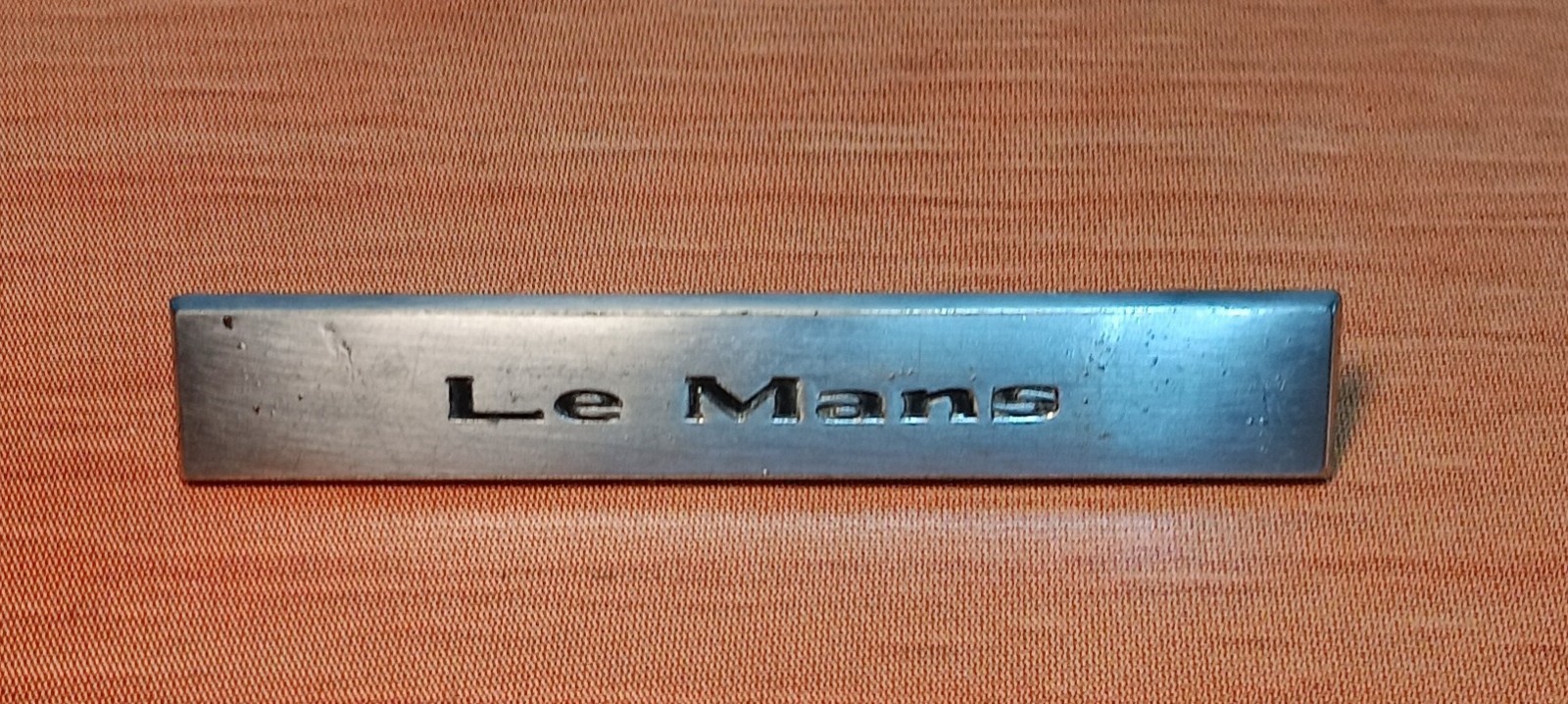 PONTIAC LE MANS LEMANS EMBLEM PART NUMBER 7725670 - Photo 1