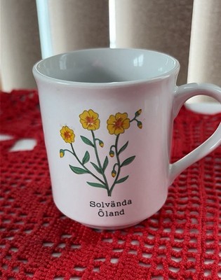 Swedish Coffee Mug with Yellow Flowers. Translation Sunrose Oland Sweden