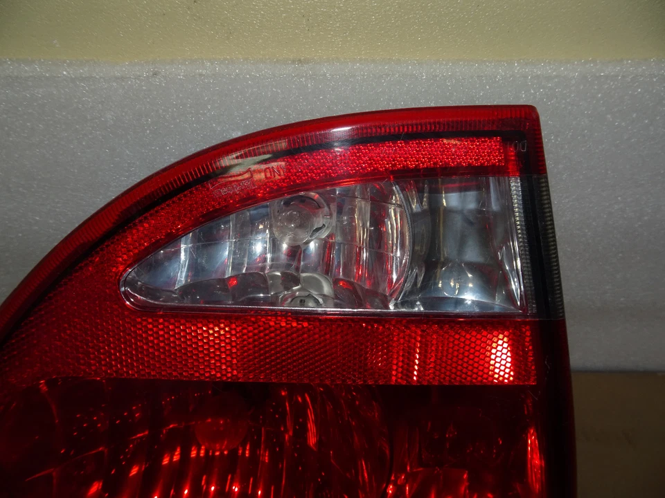 OLDSMOBILE ALERO 1999-2004 OEM TAPA MALETERO IZQUIERDO LUZ TRASERA FÁBRICA Foto 2 de 4