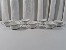 O P co Syracuse China (7) Blue Swag & Jewel Double Handled Cups