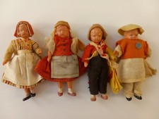 Four Small Celluloid Dollhouse Dolls 3.75"