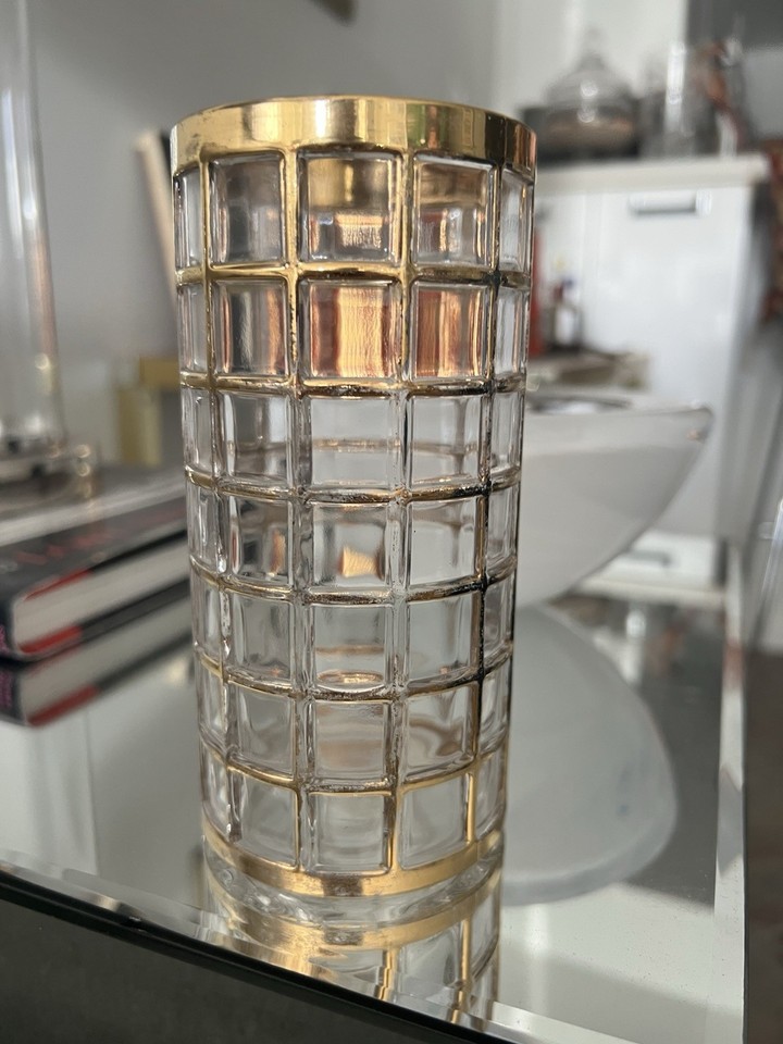 1960s Imperial Glass 'Toril de Oro' highball glasses with their striking gold toreador motif — genuinely rare MCM barware with serious visual drama.