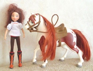 spirit riding free horse and doll