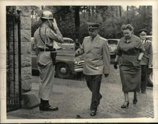 1956 Press Photo US military salutes Soviet General Chemov with wife, Germany