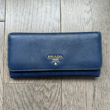 Authentic Prada Navy Saffiano Wallet with a Gold Logo