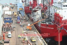 PHOTO DOCKSIDE ACTIVITY AT FALMOUTH DOCKS WORK IS IN PROGRESS ON ADAPTING THE J