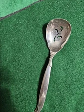 1847 Rogers IS Slotted Sugar Spoon. Pattern: Flair   6" Long.  Good Condition.