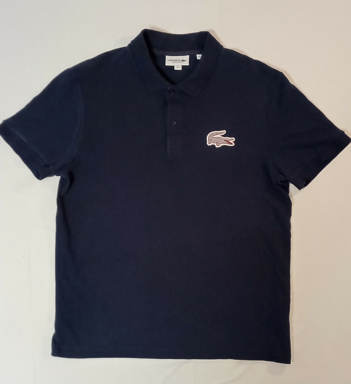 shirt with alligator logo
