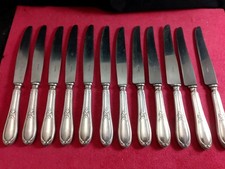 Service de 12 couteaux de table en métal argenté Ercuis modèle Lauriers