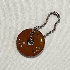 The Sak Logo Round Bag Charm Hang Tag Silver Tone Brown Orange Beaded Chain 1"