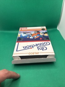 City Connection NES Aut&eacute;ntico. Probado. Caja y juego. Sin manual.