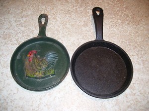 Pair of Vintage Decorative Small Cast Iron Skillets 1 with Rooster on it